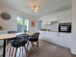 Appartements Le Central - Rez de jardin : photos des chambres