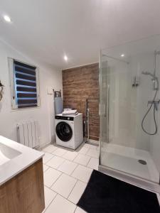 Appartements Le Central - Rez de jardin : photos des chambres