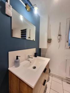 Appartements Le Central - Rez de jardin : photos des chambres