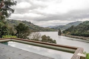 Riverside Retreat w Infinity Pool by HostWise