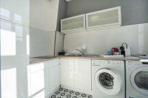 Appartements charming city center flat : photos des chambres