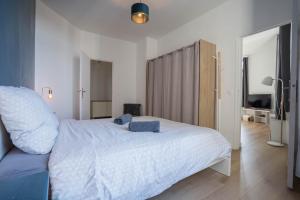 Appartements charming city center flat : photos des chambres