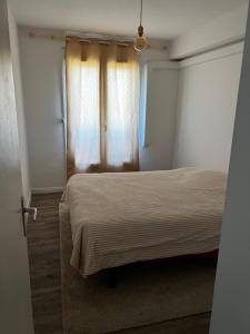 Appartements Appartement vue sur mer et montagne : photos des chambres