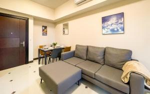 Cozy 2BR Suite in Uptown BGC with PS4 and walking distance to Malls and Restaurants