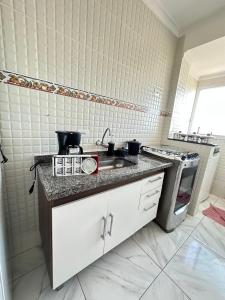 apartamento próximo a praia condomínio ubirajara