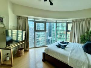 Palms Paradise with the best view of BGC plus Netflix