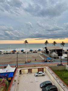 Apartamento pé na areia de frente para o mar