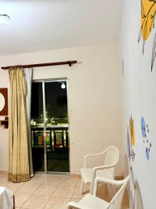 Apartamento pé na areia de frente para o mar