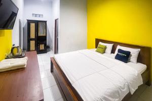 Urbanview Hotel Grand Seven One Manna