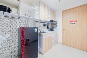 Comfort 1BR without Living Room Bintaro Embarcadero Apartment By Travelio