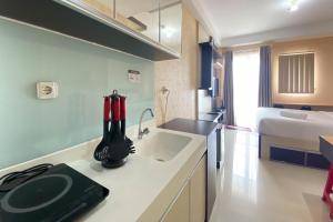Best and Homey Studio at Signature Park Grande Apartment By Travelio