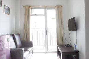 Comfy 2BR Apartment at Mekarwangi Square Cibaduyut By Travelio