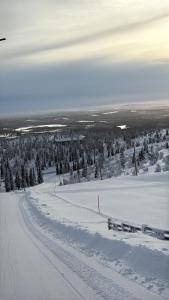AuroraLevi Utsuvaara Retreat, Ski-In-out, 2 ski pass included to price