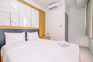 Modern and Comfort 2BR Transpark Cibubur Apartment By Travelio