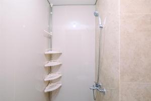 Modern and Comfort 2BR Transpark Cibubur Apartment By Travelio