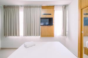 Modern and Comfort 2BR Transpark Cibubur Apartment By Travelio