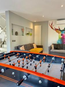 Maisons de vacances Gites Spa Strasbourg - Villa Cerf - SPA Prive, Sauna, Borne d'arcade, Babyfoot : photos des chambres