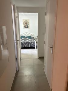 Appartements Appartement climatise avec jardin 4 personnes : photos des chambres