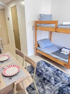 Unistay SHORE Residence w Balcony Amazing Manila Bay view near MOA