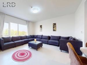 Bright and Cozy 2BR Apartment in Emaar South