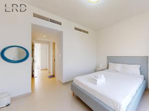 Bright and Cozy 2BR Apartment in Emaar South