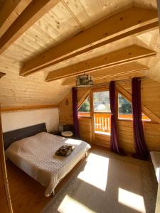 Chalet bois au calme, en lisière de forêt, balcons, sentiers balades Gérardmer & Alsace "Chalet Mon beau sapin"
