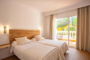 Twin Room with Balcony room in Hotel Cupidor