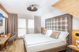 Superior Dreibettzimmer mit Balkon