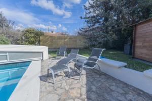 Appartements Le Patio Bleu - Les CAMOINS : photos des chambres