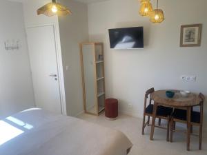 Appartements Gite Les Pieces du Moulin : photos des chambres