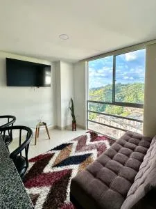 Lindo Apto central Urban Mzles - مانيزاليس