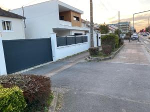 Appartements appart studio RDC de maison avec exterieur proche Reims : photos des chambres