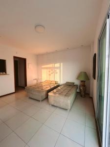 Cobertura com Banheira e Cama King