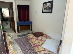 Quarto com banheiro privativo 2km do centro