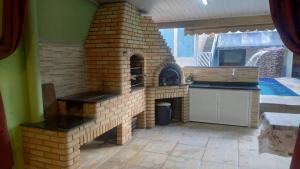 Linda casa Edícula "fundos do terreno" com piscina