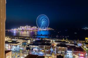 Dubai Eye and Sunset Views 1 Bedroom Apartment with Direct Beach Access, Gym, and Pool