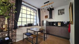 Appartements L-Atelier de l-Arc : photos des chambres
