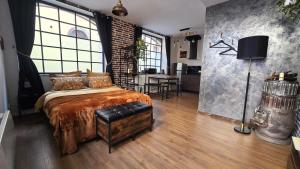 Appartements L-Atelier de l-Arc : photos des chambres