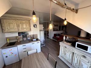 Appartements Studio 4 voyageurs quelques minutes de Disneyland Paris parking prive gratuit : photos des chambres