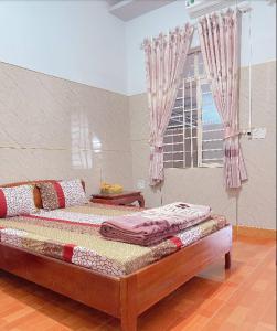 Nhà Nghỉ Hoàng Trang Hồ Ekao