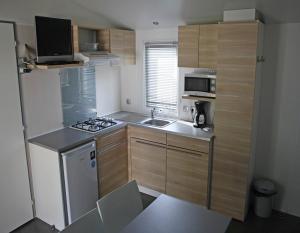 Campings BONNES VACANCES sur le CAMPING LE BOSC : photos des chambres