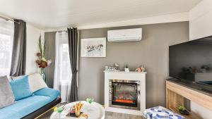 Campings LE REFUGE DU LAC - Sejour d-Exception avec Vue imprenable sur le Lac - Piscines Sauna Salle Fitness Bibliotheque Restaurant - 10min des Sables d-Olonne : photos des chambres