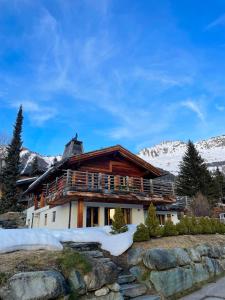 Chalet Les Moulins 5 chambres cheminée piscine sauna parking privé