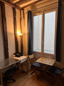 Appartements Studio cosy au coeur de Paris : photos des chambres