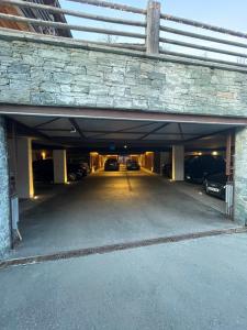 Chalet Les Moulins 5 chambres cheminée piscine sauna parking privé