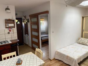 Domek przy lesie Mazury - noclegi całoroczne