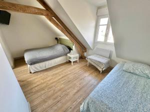 Appartements Maison - 2 chambres - Terrasse - Babyfoot : photos des chambres