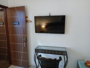 Suíte confortável com ar condicionado 101