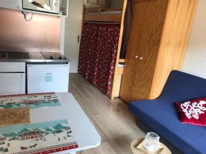 Appartements Studio cabine 4 couchages vue sur les pistes : photos des chambres