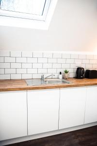 Converted bank centre of Holmfirth -split apartment, Bronte- Archive